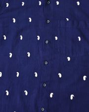 Kashmiri Aari embroidery with repeated buta motifs on a deep navy shirt, showcasing fine chain stitch detailing and evenly spaced traditional patterns