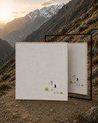 Chamba Rumal - Himalayan Goat in handwoven khadi cotton, featuring a hand-embroidered Himalayan goat and kid, shown against a steep mountain landscape with a mirror revealing identical do-rukha embroidery on both sides.