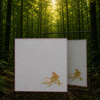 Chamba Rumal in handwoven khadi cotton, featuring a hand-embroidered monkey and young monkey on a tree branch, shown in a dense forest setting with a mirror revealing identical do-rukha embroidery on both sides.
