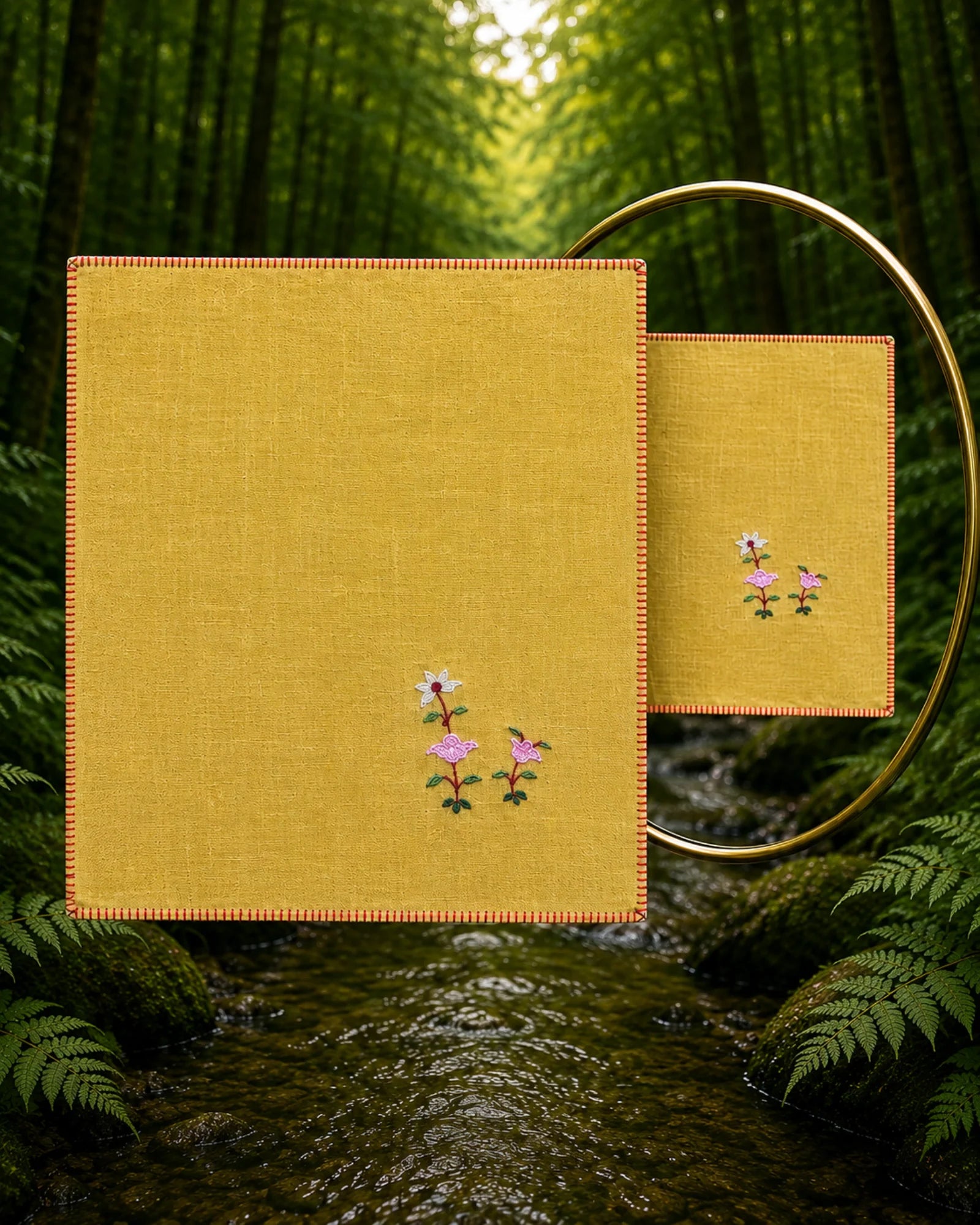 A 100% Khadi cotton Chamba Rumal from the Pushp Vatika collection featuring hand embroidered white and pink buds, finished with hand hemming and photographed beside a mirror to reveal matching embroidery on both faces.