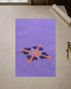 Kasuti Sahyadri hand-embroidered khadi cotton handkerchief featuring a peacock motif worked in orange, yellow and deep purple thread.