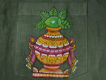 Load image into Gallery viewer, Close-up of hand-painted Odisha Pattachitra detailing on a linen shirt pocket showing a ceremonial kalash form with mango leaves, ornamental borders, and fine painted linework.