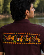 Sohrai Jeev Pravah upper-back artwork close-up featuring a peacock and peahen, stag and doe, flowering vegetation and hand-painted decorative borders.