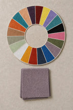 Svasutra handloom muslin khadi handkerchief in heather grid beside the House colour palette.