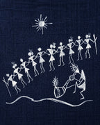 Warli Aavartan hand-painted linen shirt left shoulder close-up featuring male and female Warli figures performing the traditional Tarpa dance around a musician playing the Tarpa instrument beneath the sun.