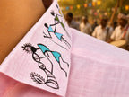 Close-up of the collar artwork on the Warli Ullas hand-painted linen shirt, showing a traditional Warli Tarpa dance with a tarpa musician leading a line of dancers, painted on linen fabric.