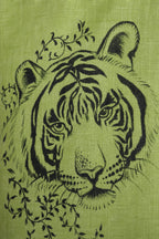Lower front panel detail of the Vanchar hand-painted linen shirt featuring tiger artwork with surrounding botanical detailing.